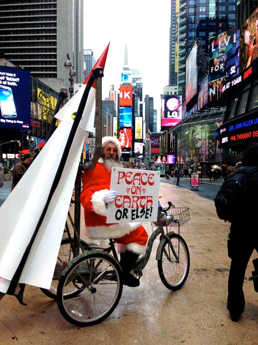 Joey Skaggs as Santa in his Santa's Missile Tow protest at Times Square New York